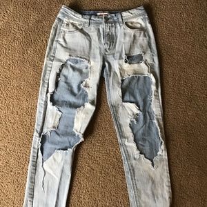 Ripped and Distressed Light Denim Boyfriend Jeans